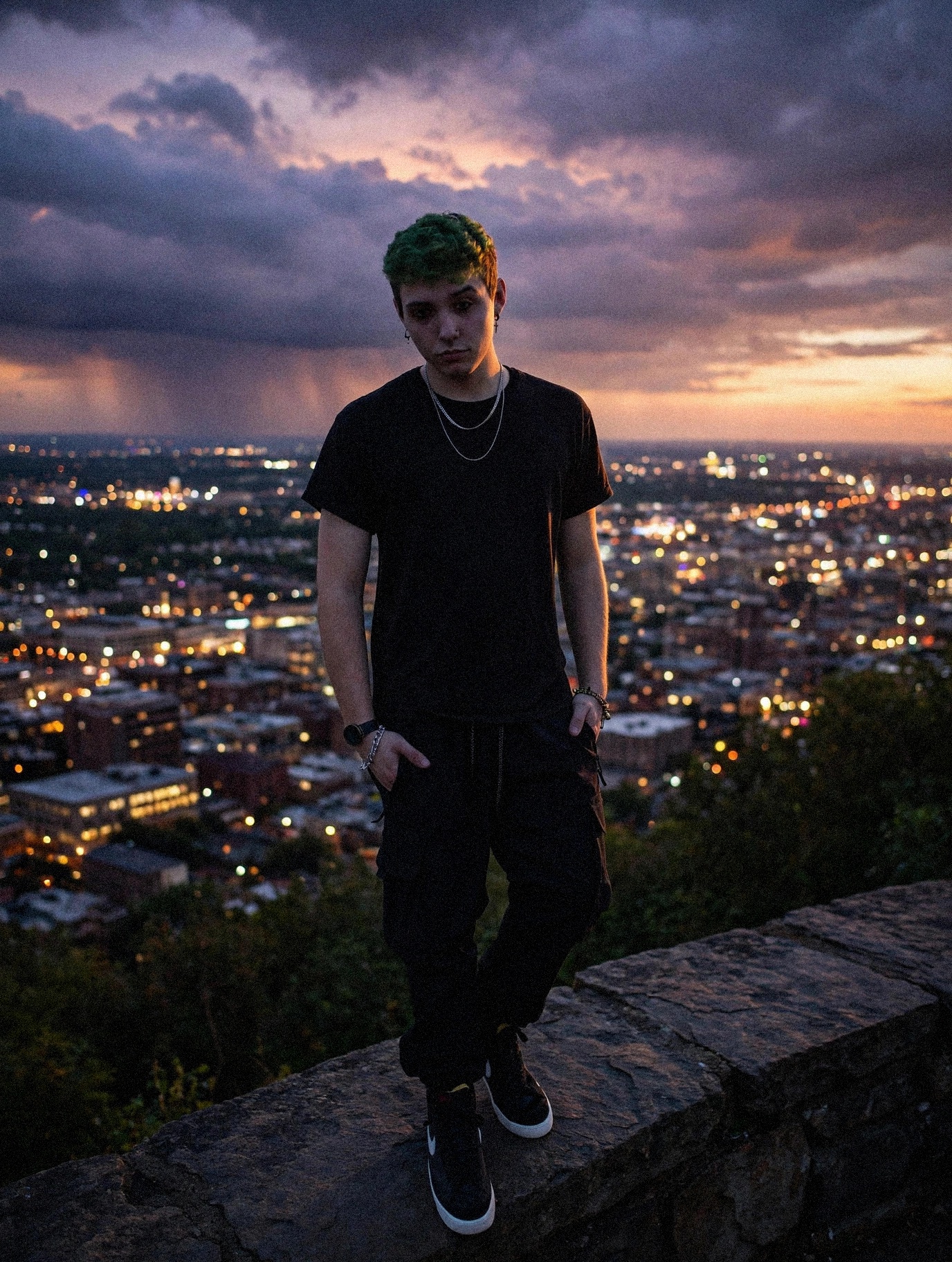 Mellow777 standing above a glittering city at dusk